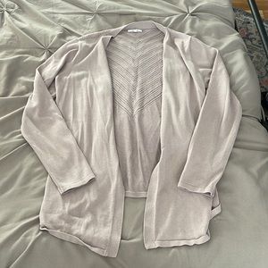 Medium light pink cardigan from Maurice’s. Lightly used.